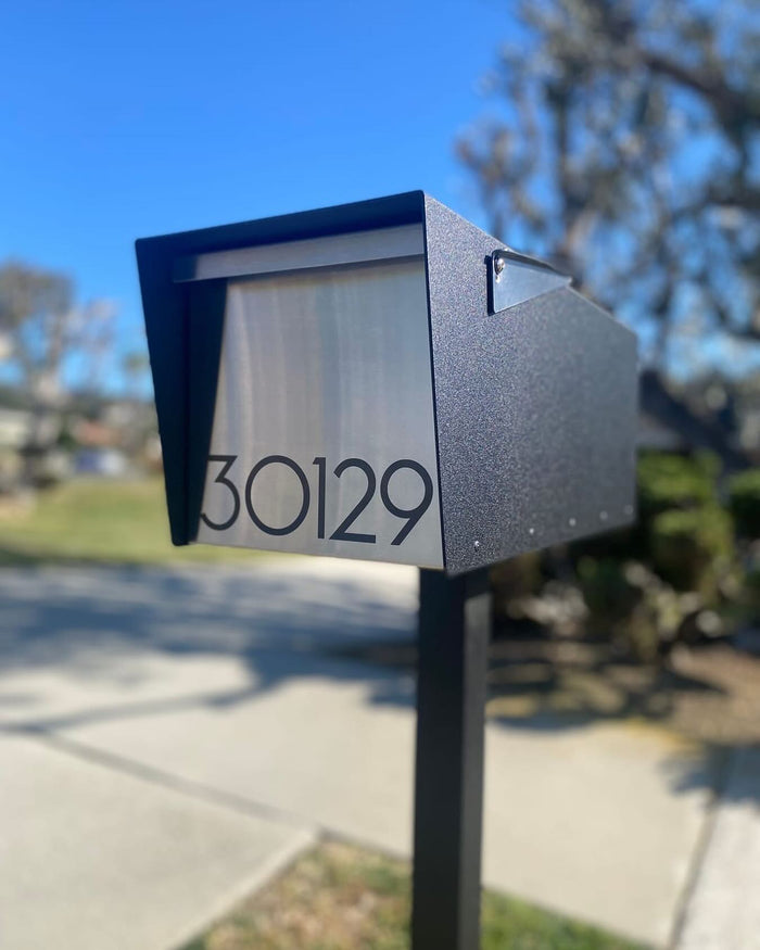 Vsons mailbox installed on a modern home