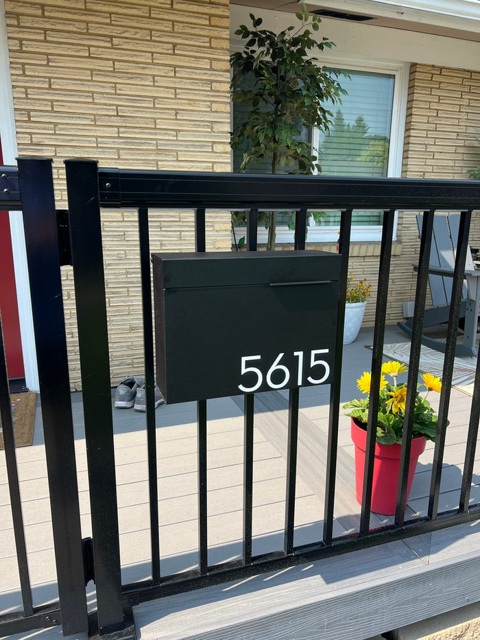 Vsons mailbox installed on a modern home